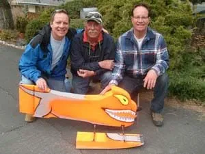 Three team members with a Goosinator unit