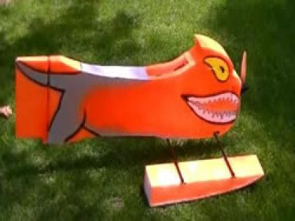 The Goosinator on grass with its battery pack
